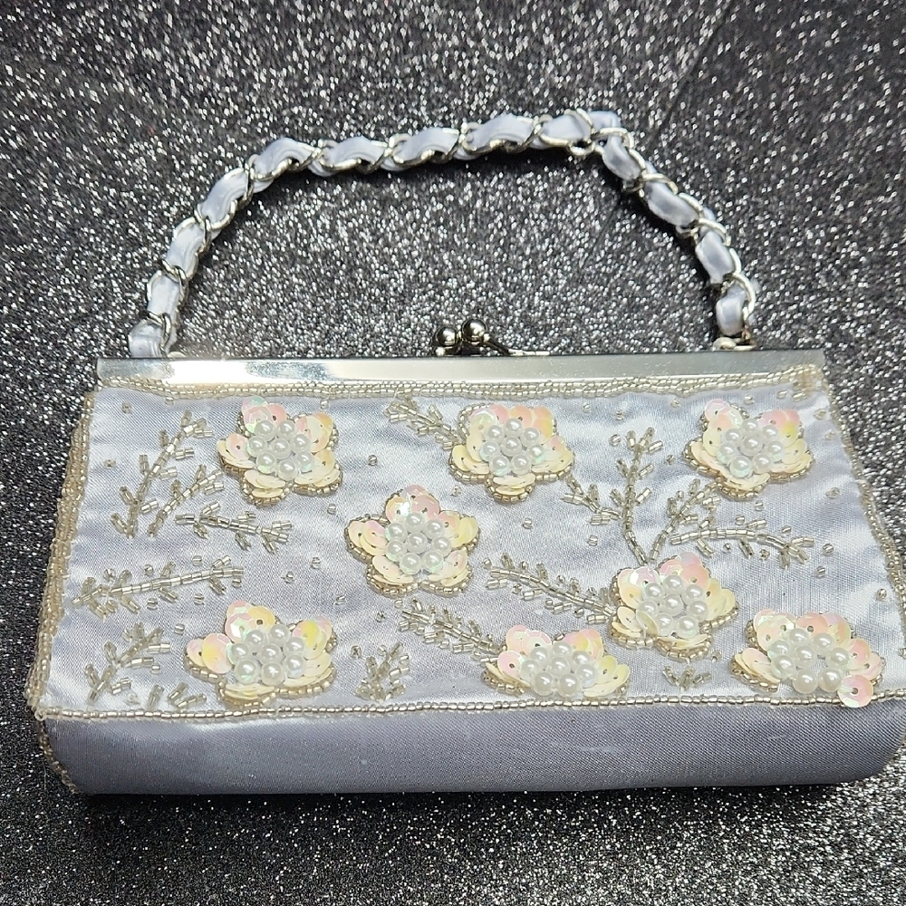 Obagi Silver Floral Embellished Wristlet